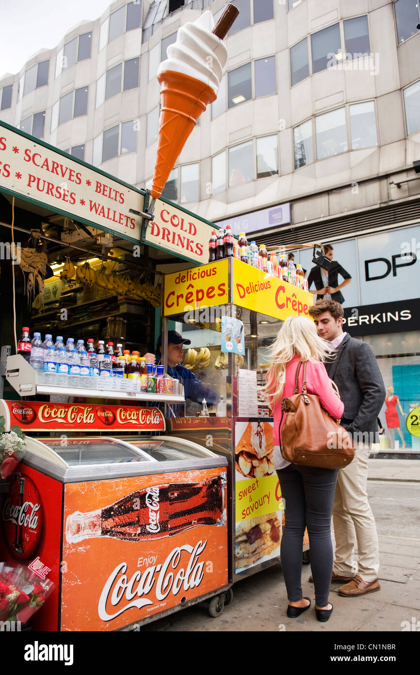 Oxford Street London West End typical snack kiosk with giant ice cream