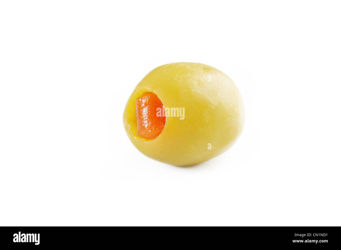 one green olive on white Stock Photo
