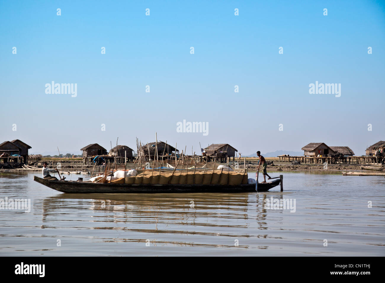 Transporting rice, Kaladan River from Sittwe to Mrauk U, Rakhine State ...