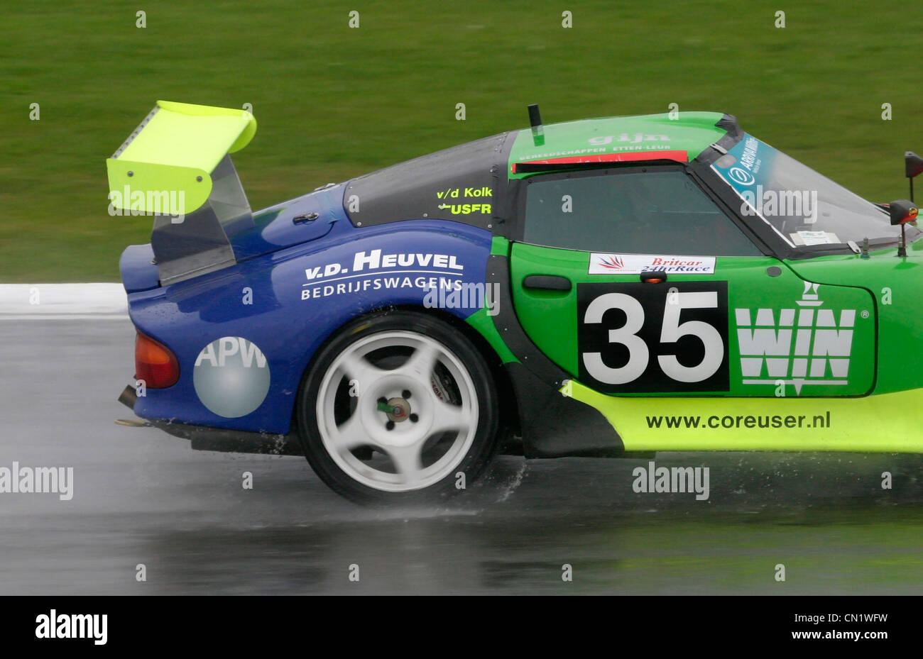 GT class endurance race at Silverstone Raceway under very wet ...
