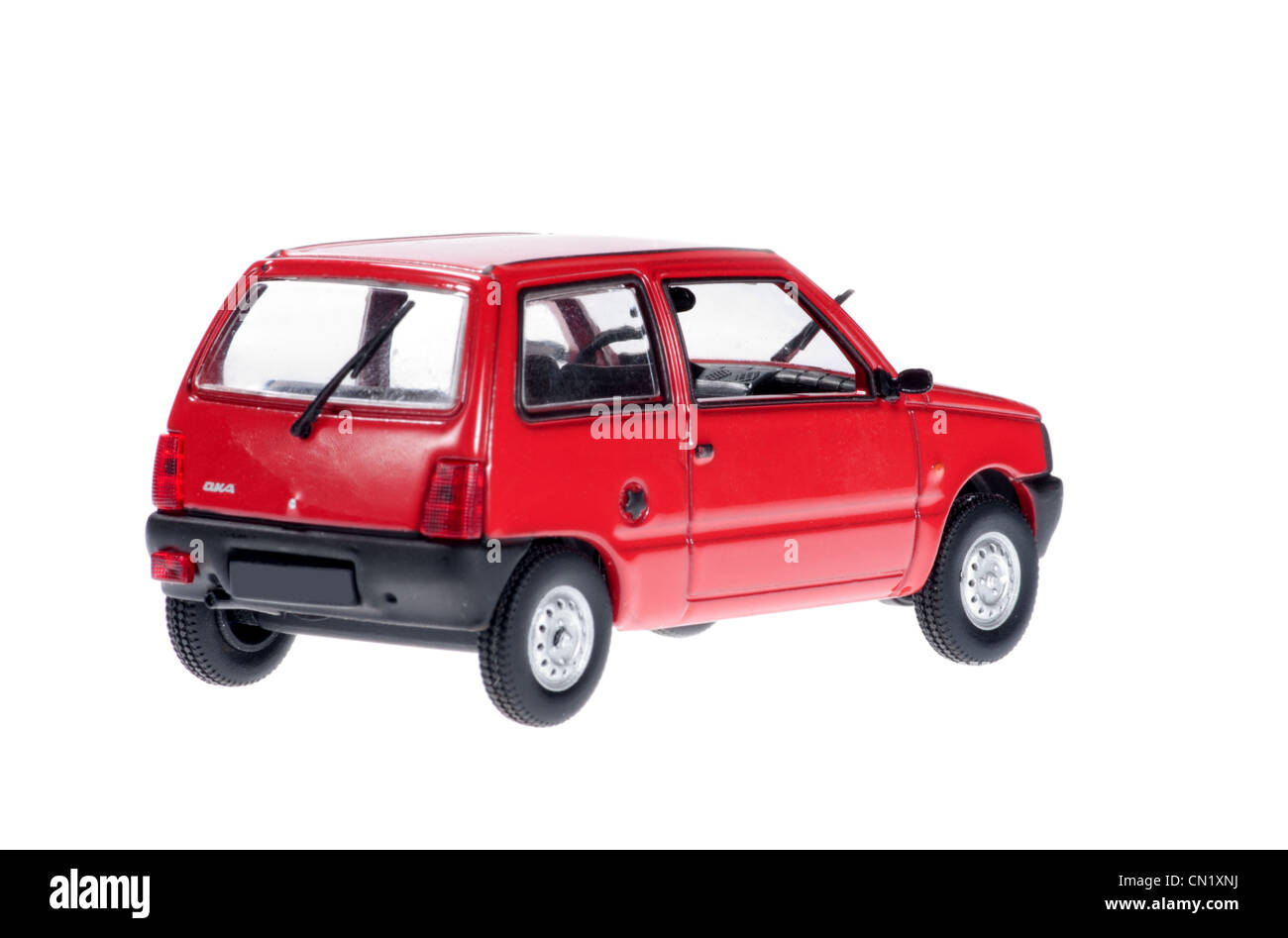 Small red car on white background. Stock Photo