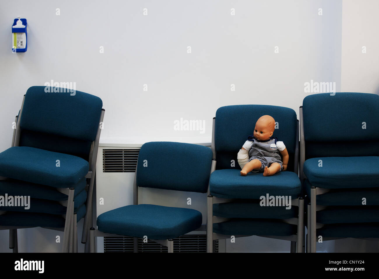 Doll on office chair Stock Photo