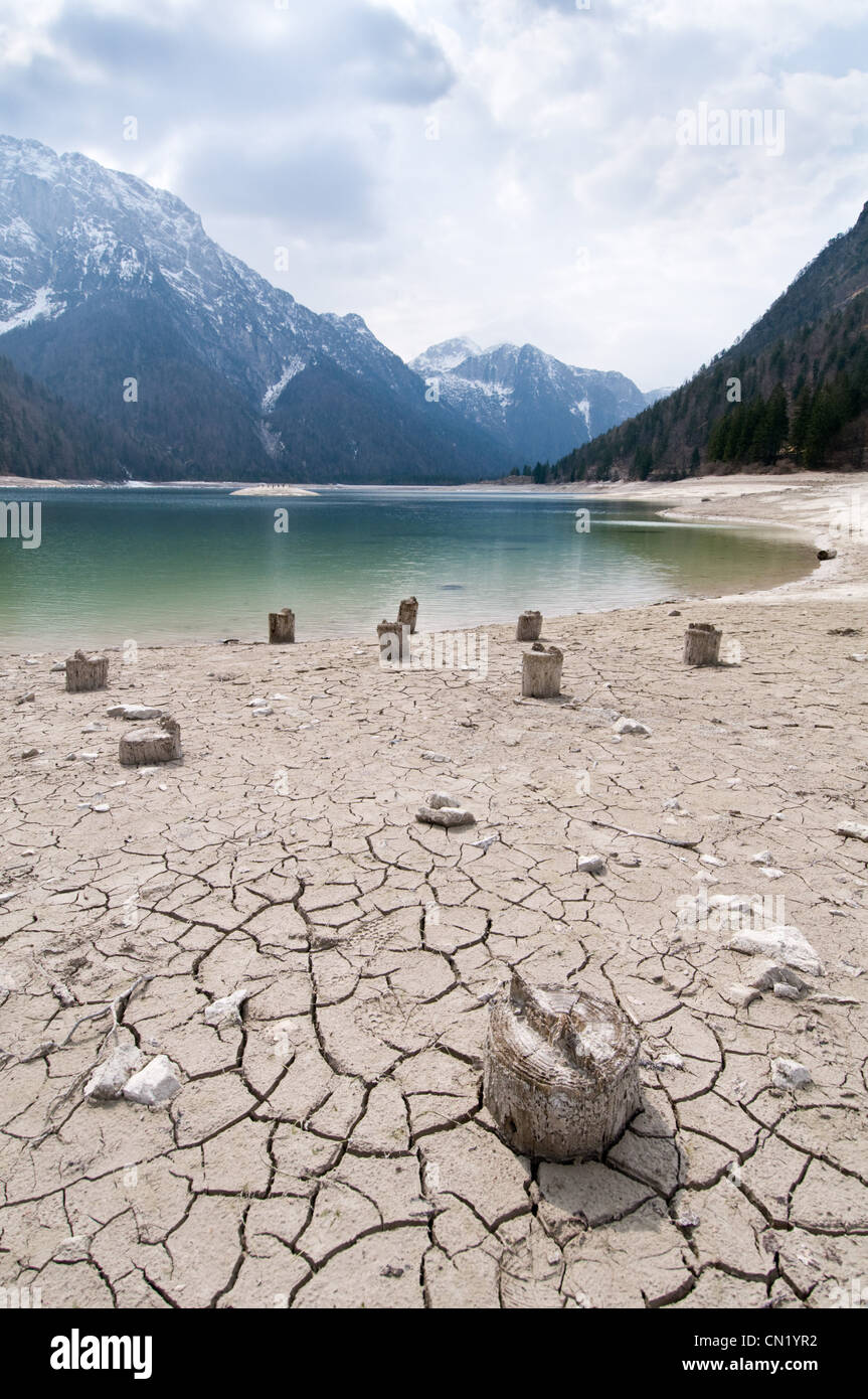 Low water level at Lago del Predil lake, Italy Stock Photo