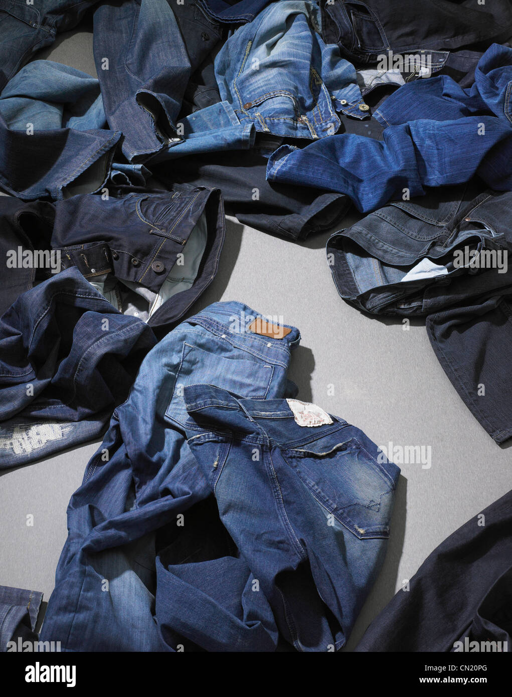 Pile of blue jeans Stock Photo