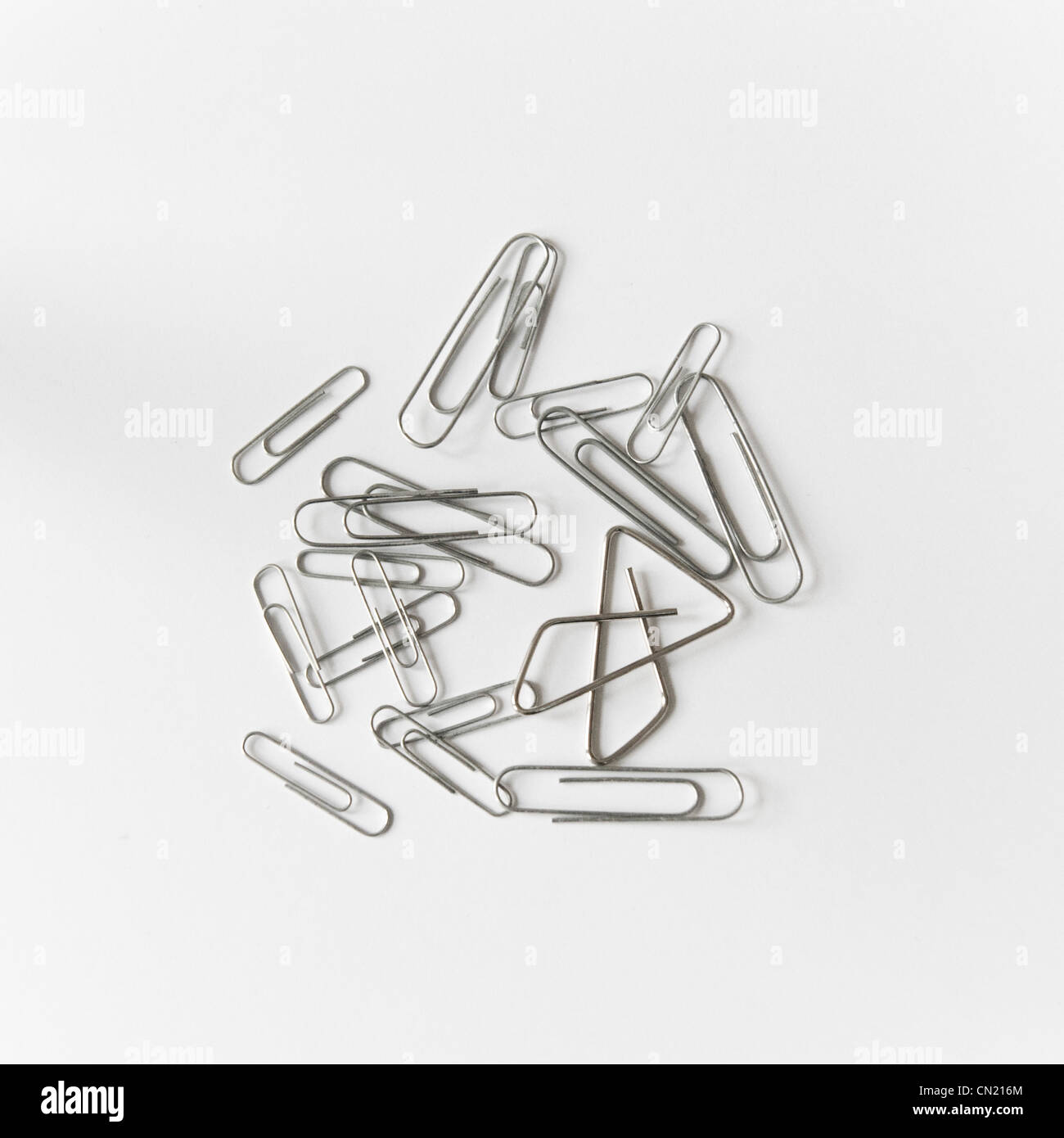 Assorted Paper Clips on White Background Stock Photo Alamy