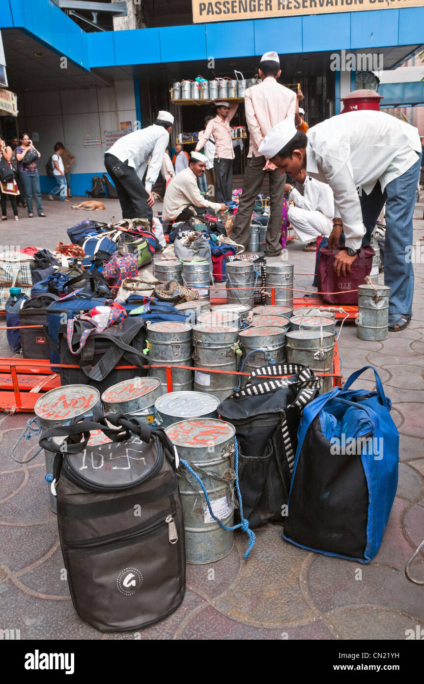Dabbawalas at work Churchgate Station Mumbai Bombay India Stock Photo