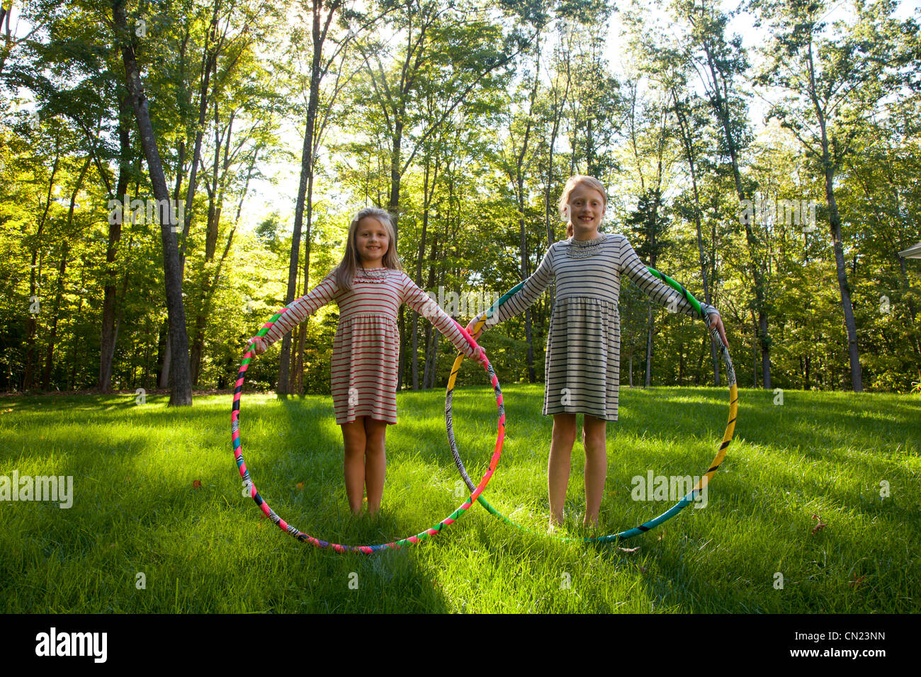 Two Girls With Hula Hoops Stock Photo