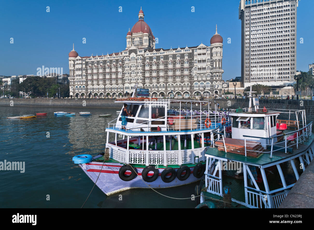 Passenger ferry boats Taj Mahal Palace Hotel Colaba Mumbai Bombay India Stock Photo