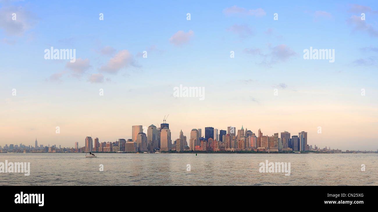 New York City Manhattan downtown skyline at sunset over Hudson River ...