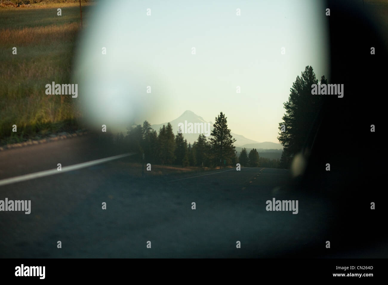 Mount Hood seen in car mirror, Portland, Oregon Stock Photo