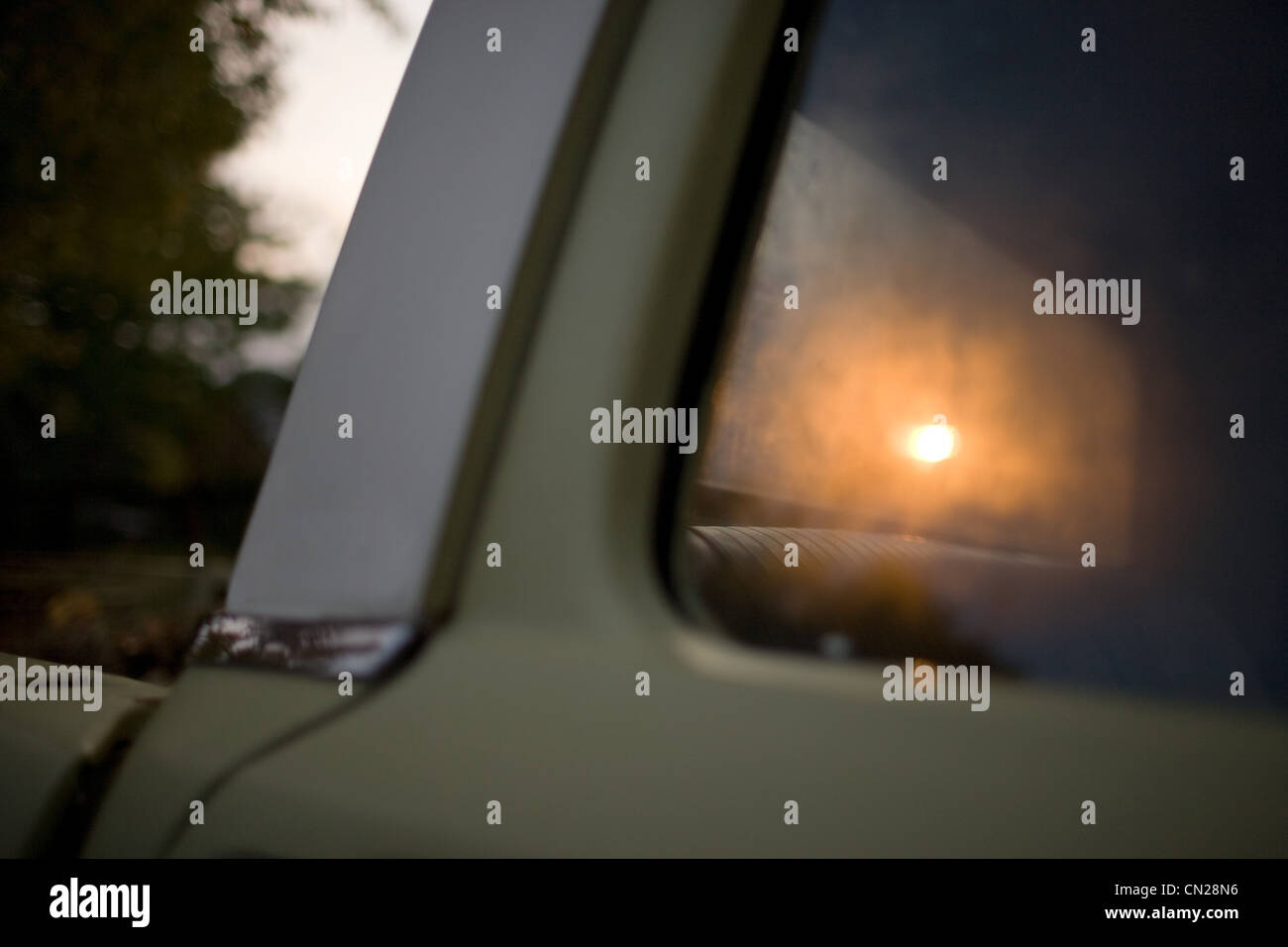 Reflection In Car Window Sunlight reflecting on car window Stock Photo - Alamy