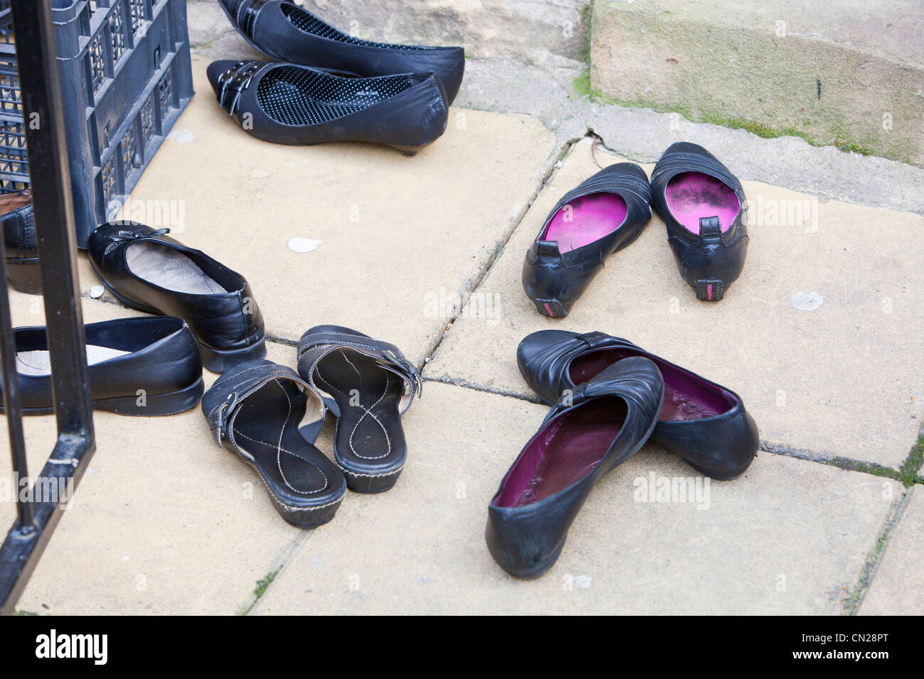 Shoes outside house hi-res stock photography and images - Alamy