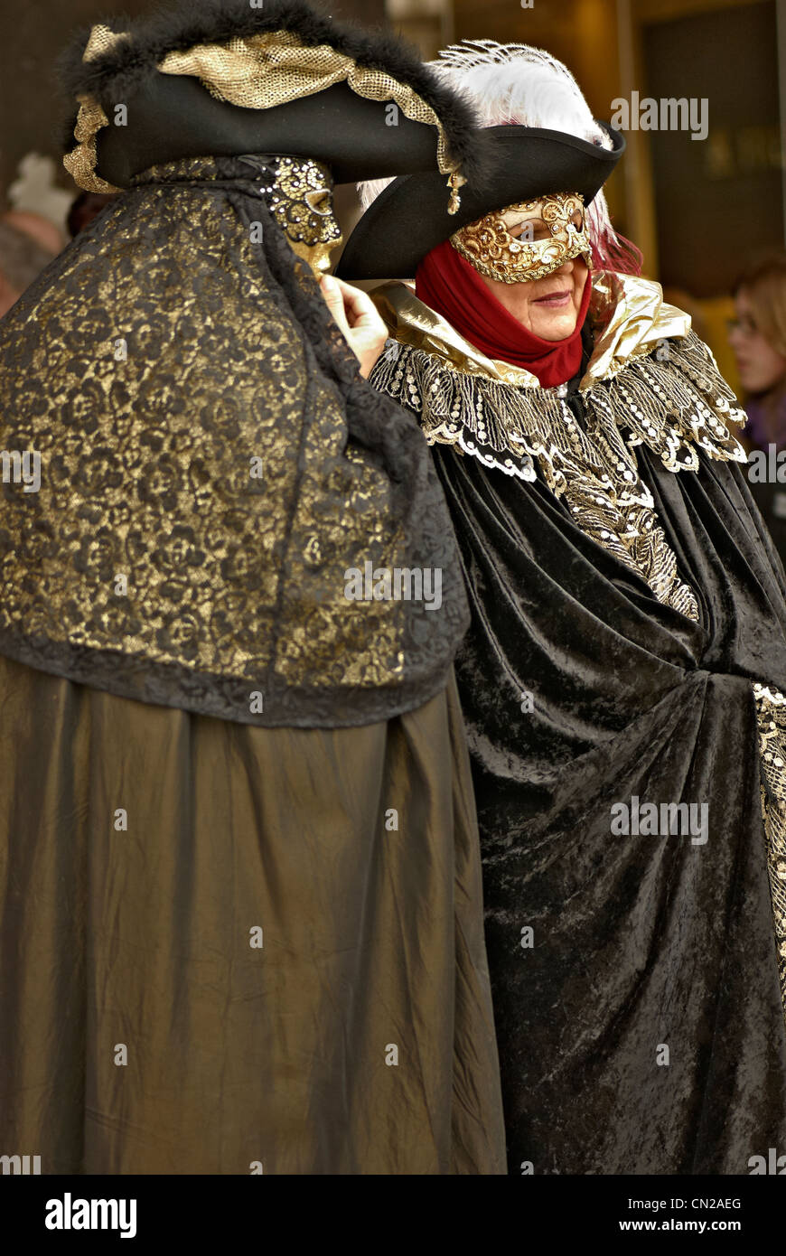 Masked people during The Venice Carnival Stock Photo - Alamy