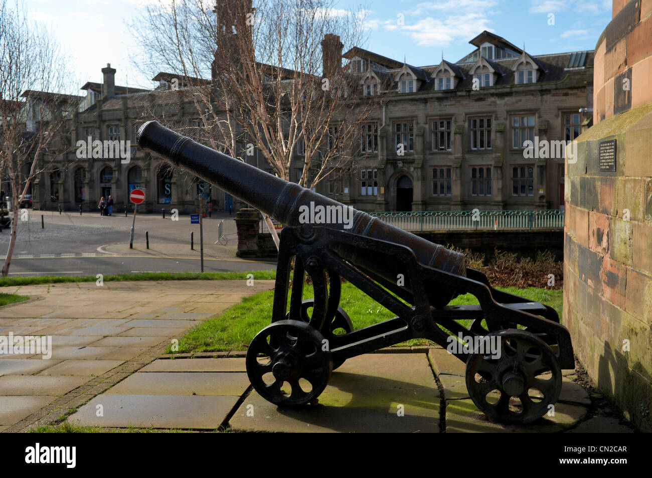 Canon situated outside the Citadel Carlisle City center with Railway Station in background,  Cumbria, United Kingdom Stock Photo