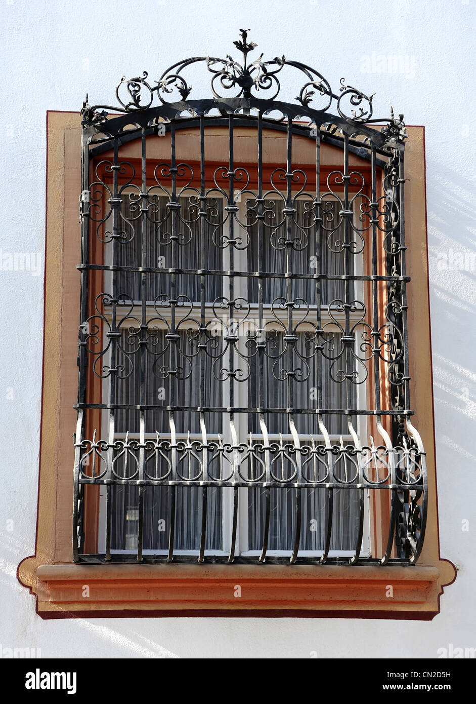 Windows with attractively designed wrought iron protection in old part