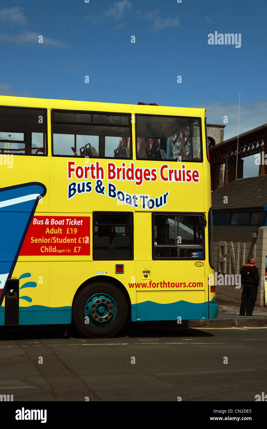 Tourist bus advertising the bus & boat trips in South Queensferry at the Forth Rail Bridge Stock Photo