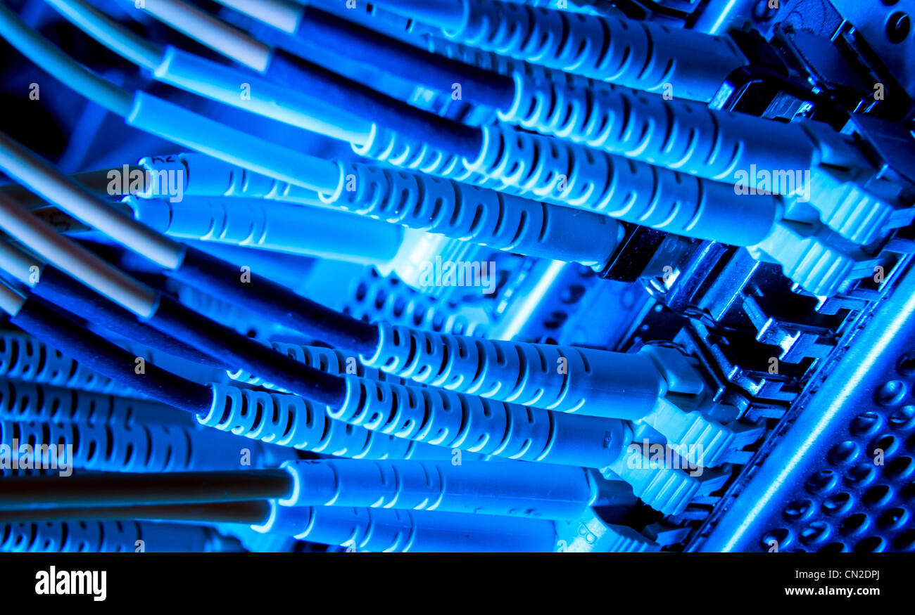 optic fiber cables connected to hub Stock Photo Alamy