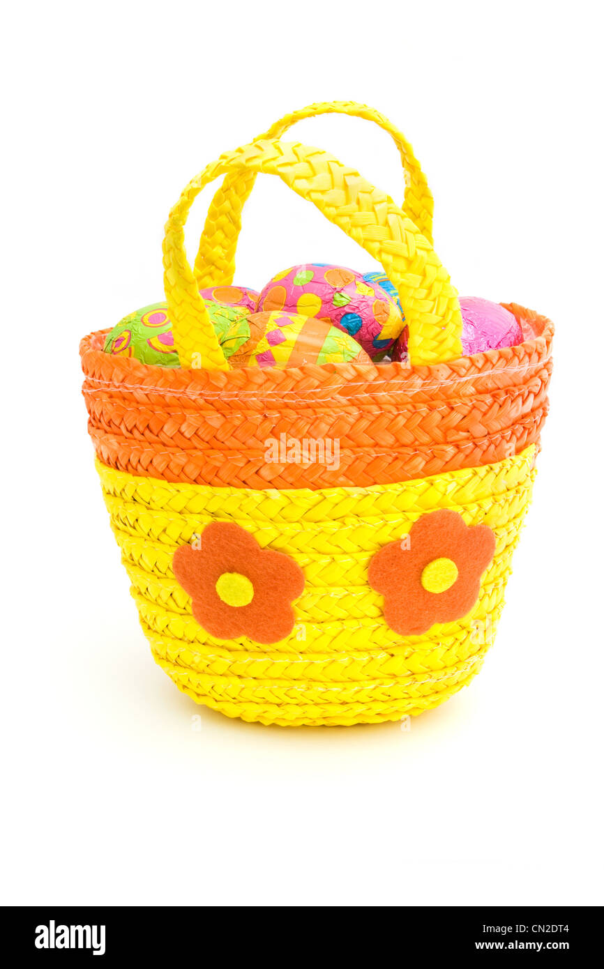Basket of easter eggs on a white background Stock Photo - Alamy