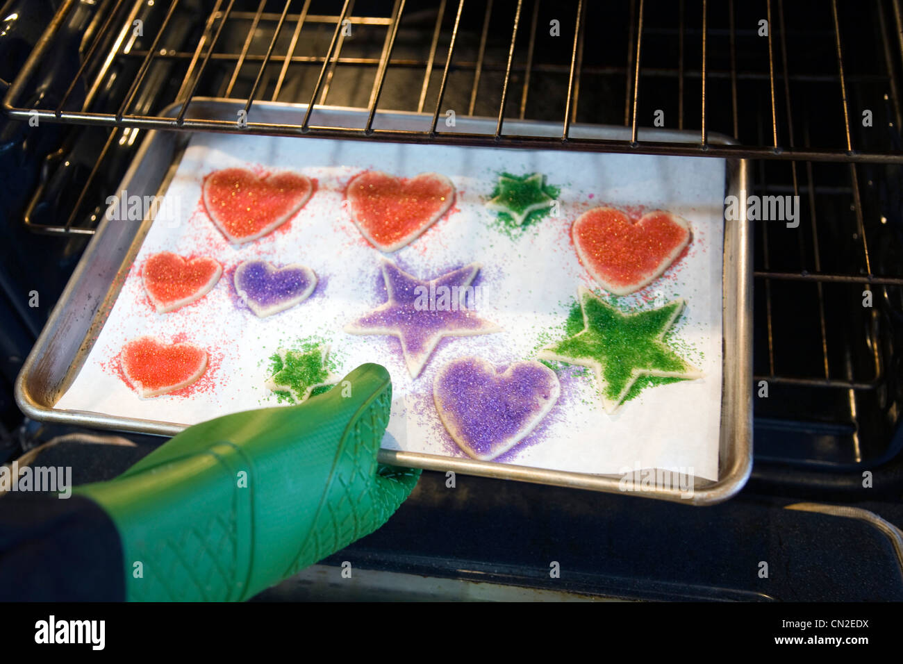 Pan of Sugar Cookies Being Placed in Oven Stock Photo Alamy