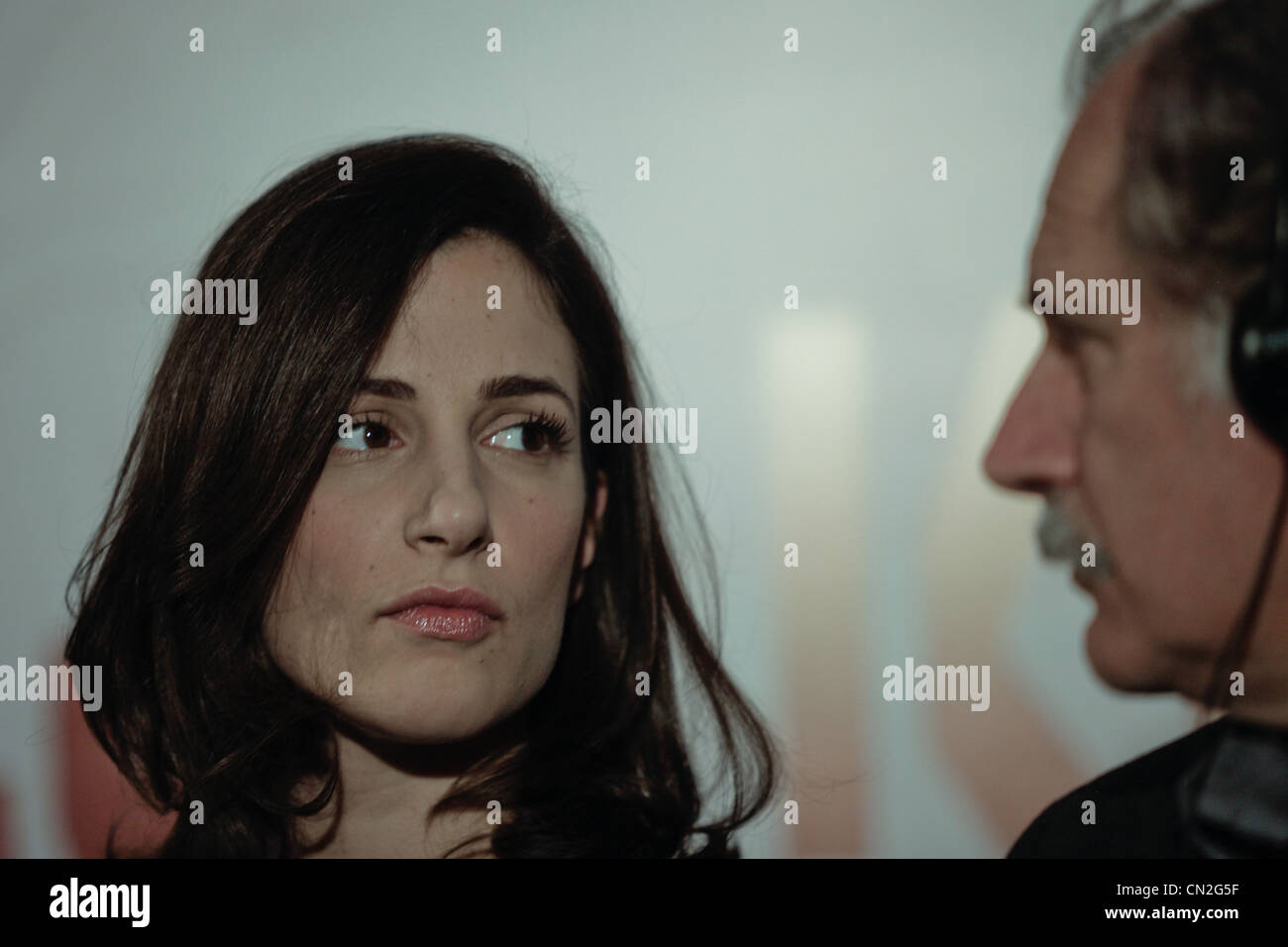 Croatian actor Rade Serbedzija (R) and Bosnian actress Zana Marjanovic (L) addresses during a press conference in Sarajevo. Stock Photo