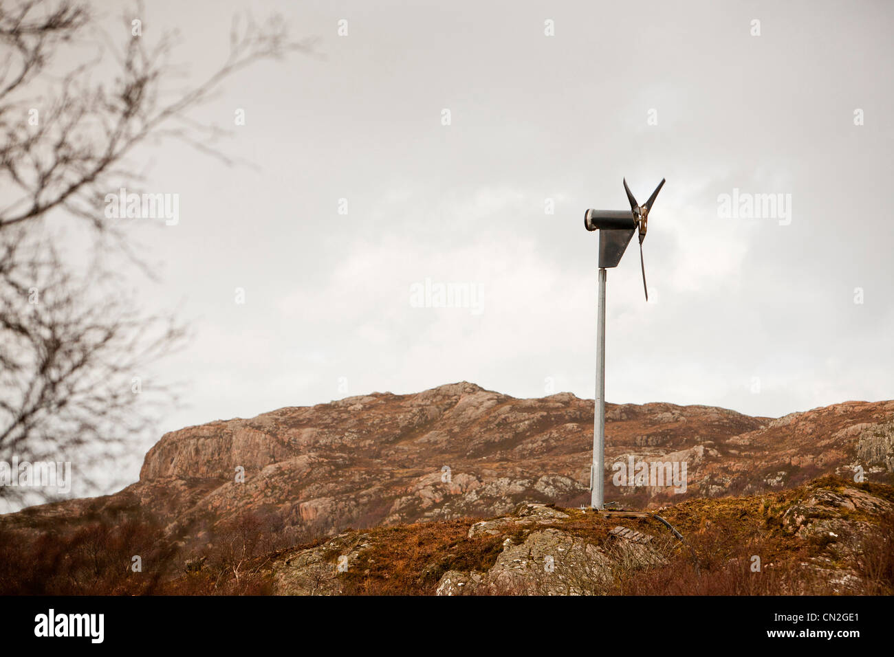 A medium scale wind turbine powering a remote house at Arnish on the Isle of Raasay, Scotland, UK. Stock Photo