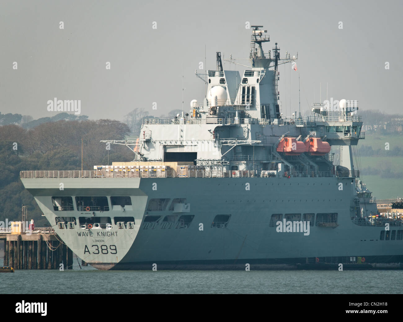 A Royal Fleet Auxiliary ship being loaded up in Devonport Docks Stock Photo