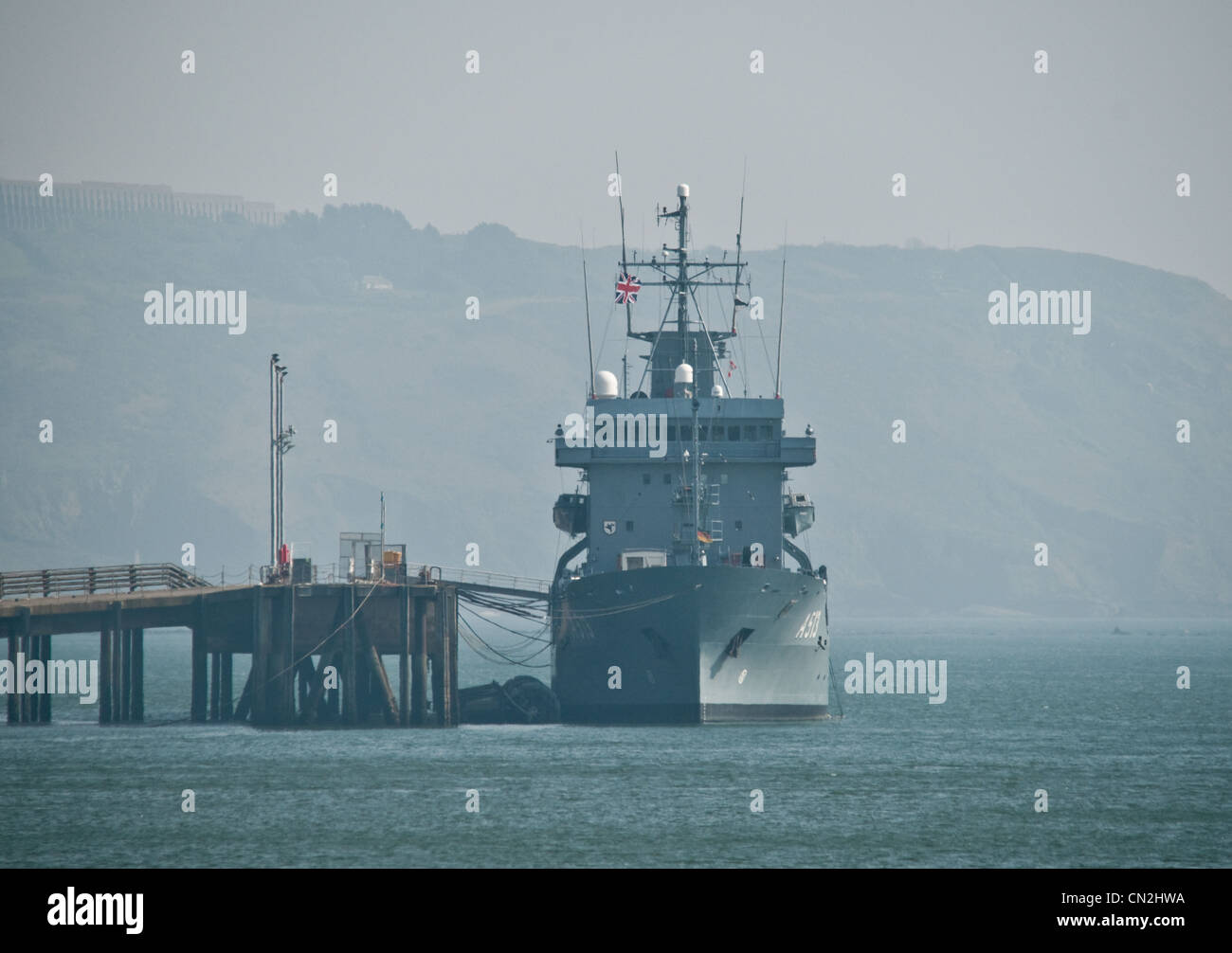 A Royal Fleet Auxiliary ship being loaded up in Devonport Docks Stock Photo