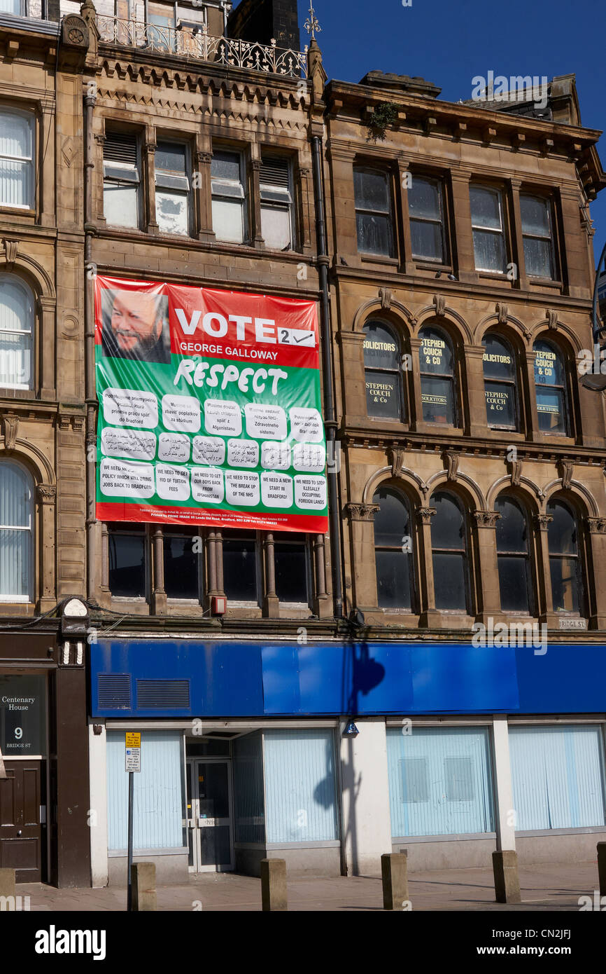 A Respect Party poster on a Bradford building, written in Slovak, Urdu and English. Stock Photo