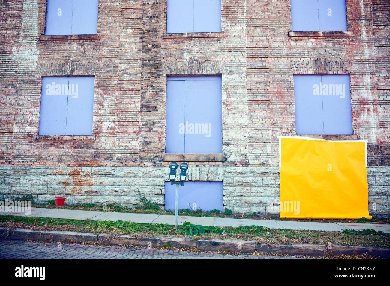 Yellow paper covering window Stock Photo Alamy