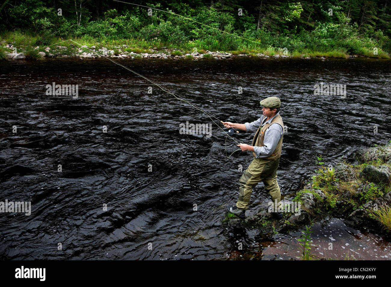 Fly fisherman in Margaree River, Cape Breton Island, Nova Scotia Stock Photo Alamy