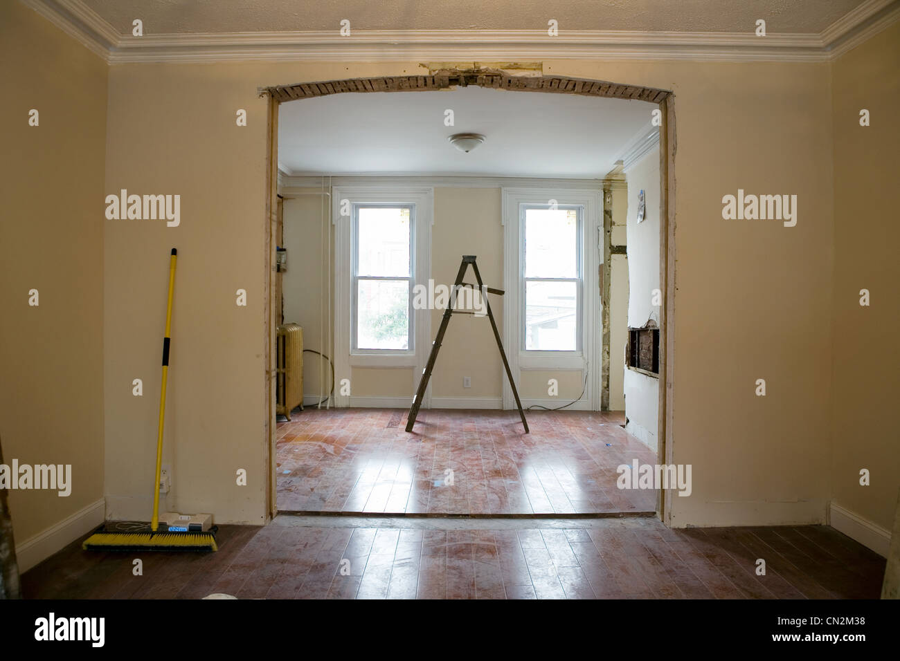 Open plan room with stepladders Stock Photo