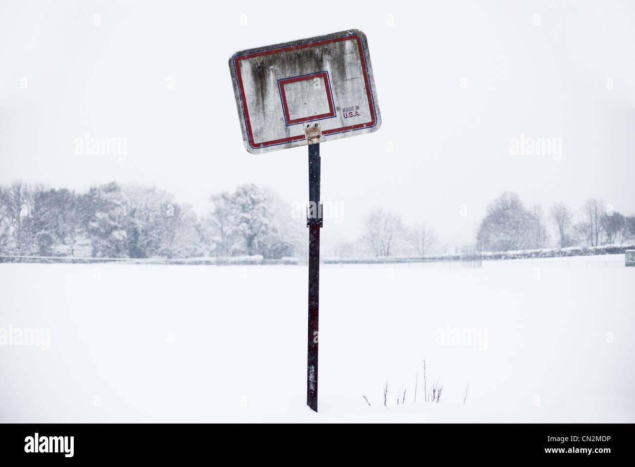 Basketball hoop in snow Stock Photo - Alamy
