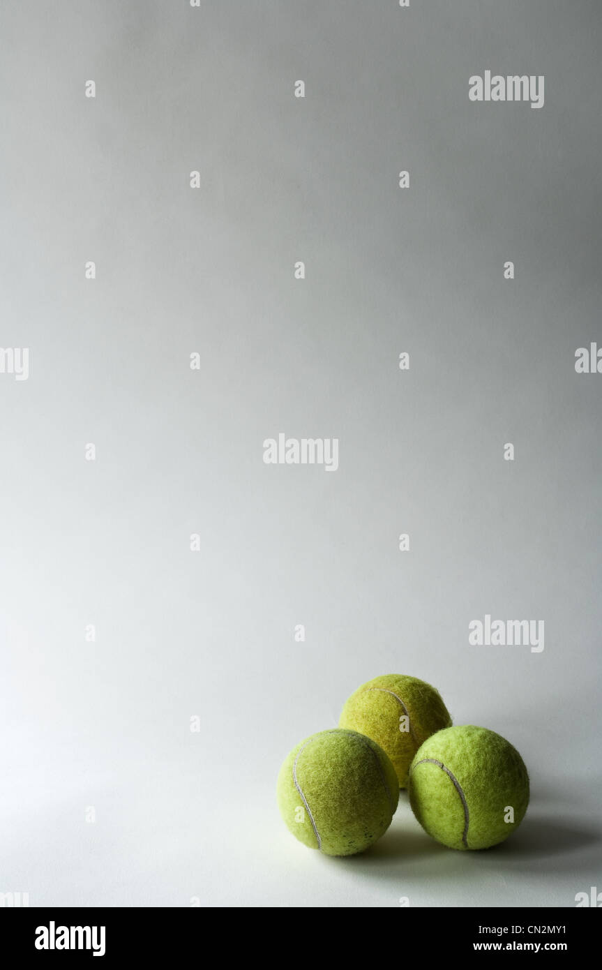 Three tennis balls, studio shot Stock Photo