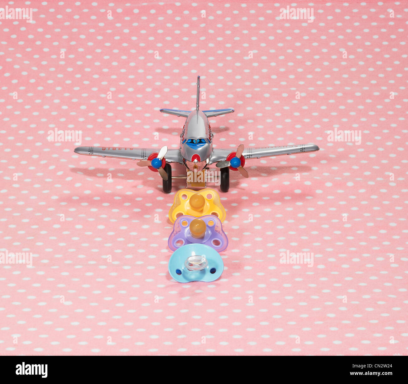 Baby Pacifiers With Toy Airplane Stock Photo