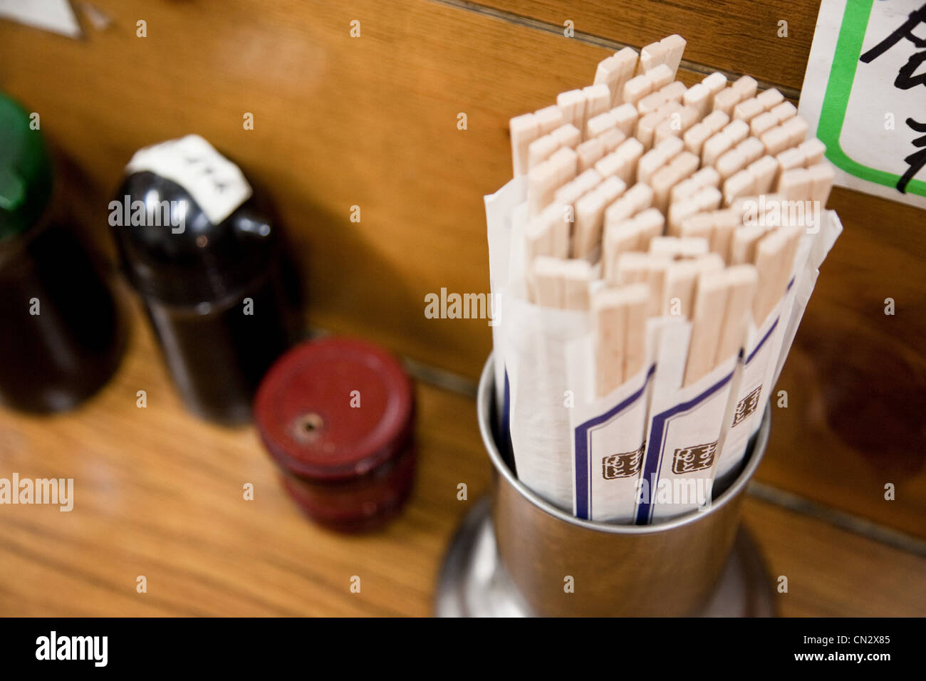 Chopsticks in restaurant, close up Stock Photo Alamy