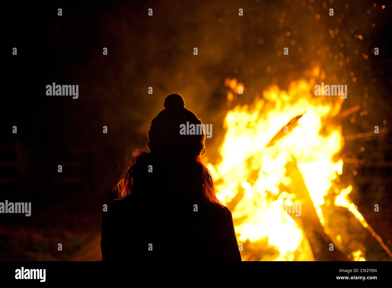 Woman on bonfire night Stock Photo
