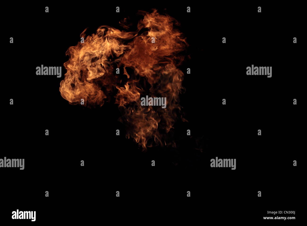 Flame of fire isolated on black - real photo Stock Photo - Alamy