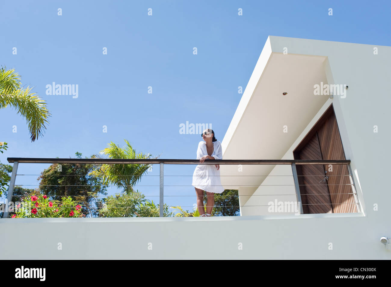 Indian woman standing in balcony hi-res stock photography and images ...