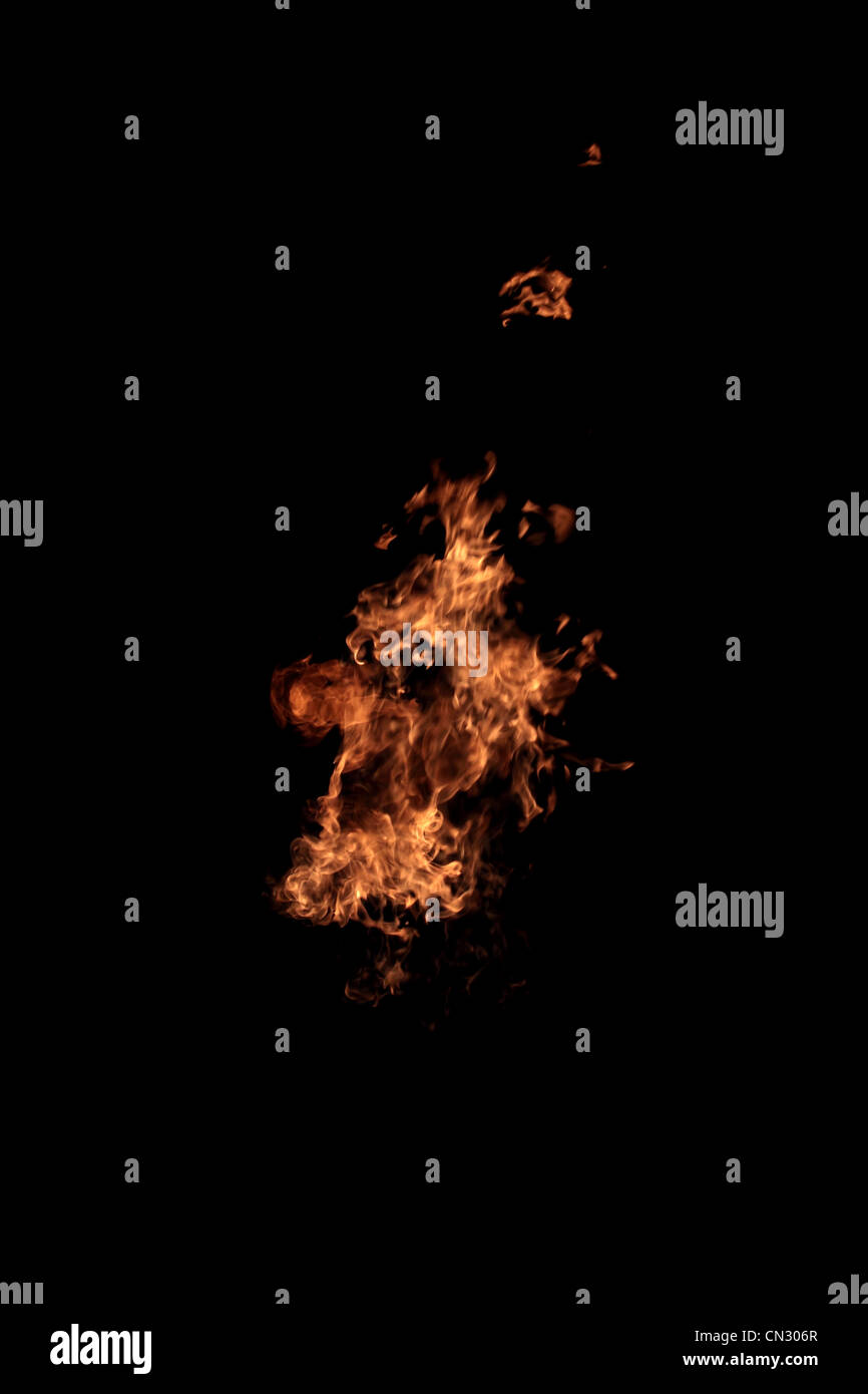 Flame of fire isolated on black - real photo Stock Photo - Alamy