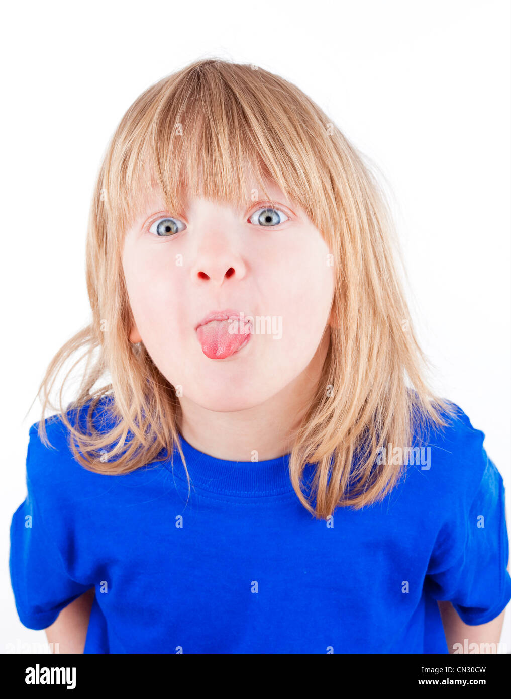 Boy With Long Blond Hair Sticking Out His Tongue Isolated On