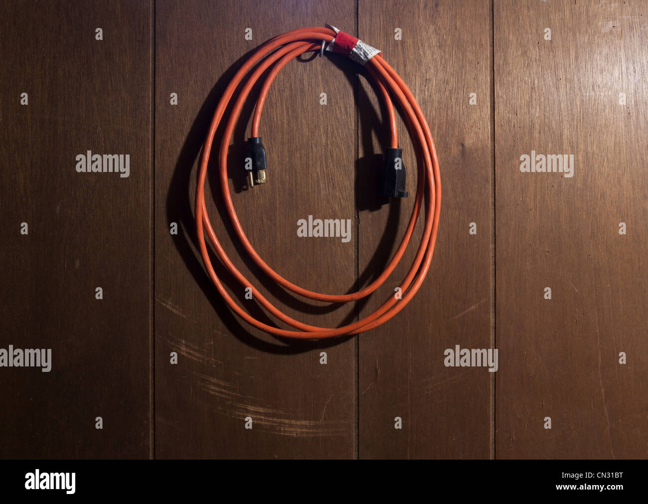 Extension cord in a coil Stock Photo Alamy
