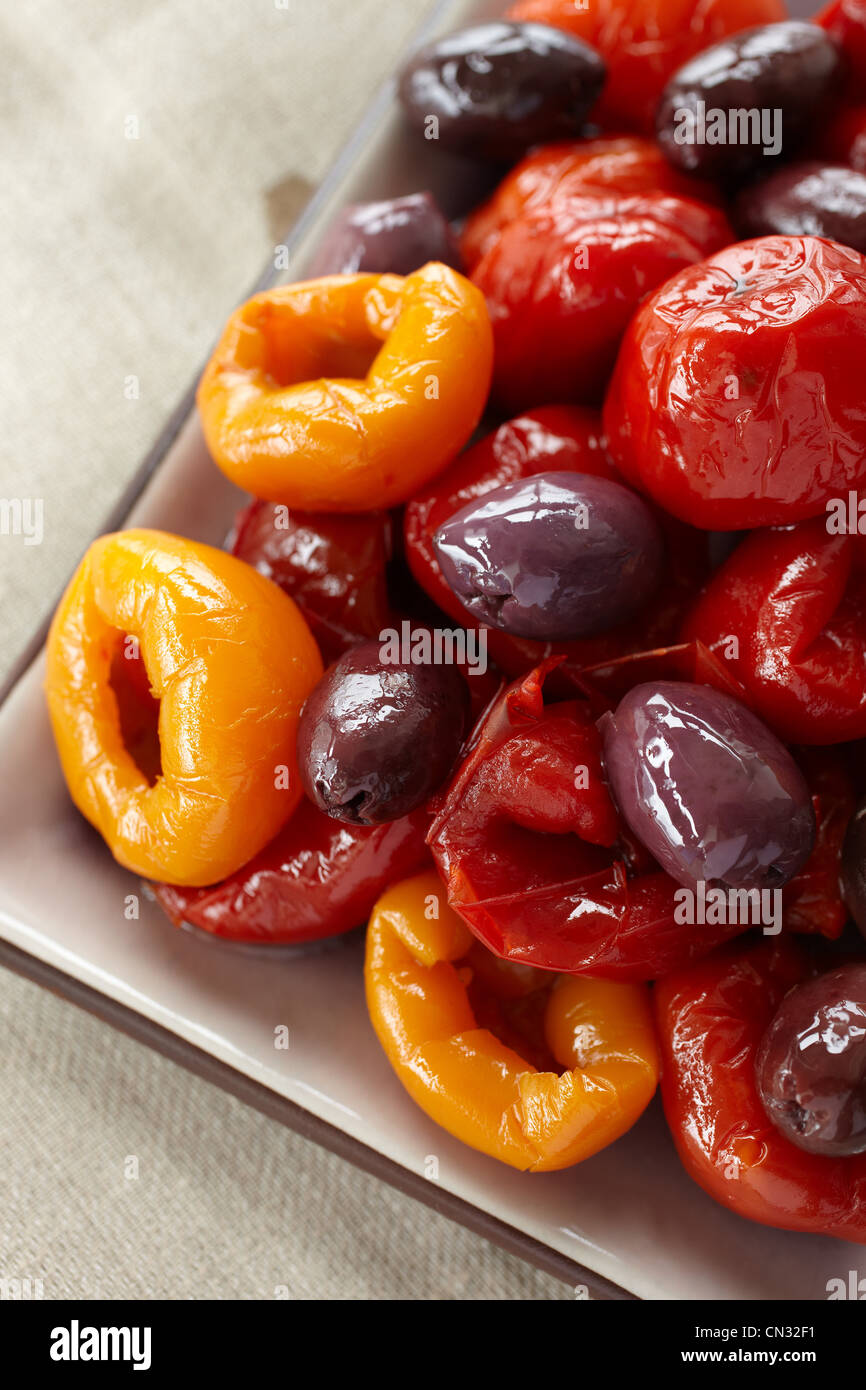 Olives and peppers, close up Stock Photo