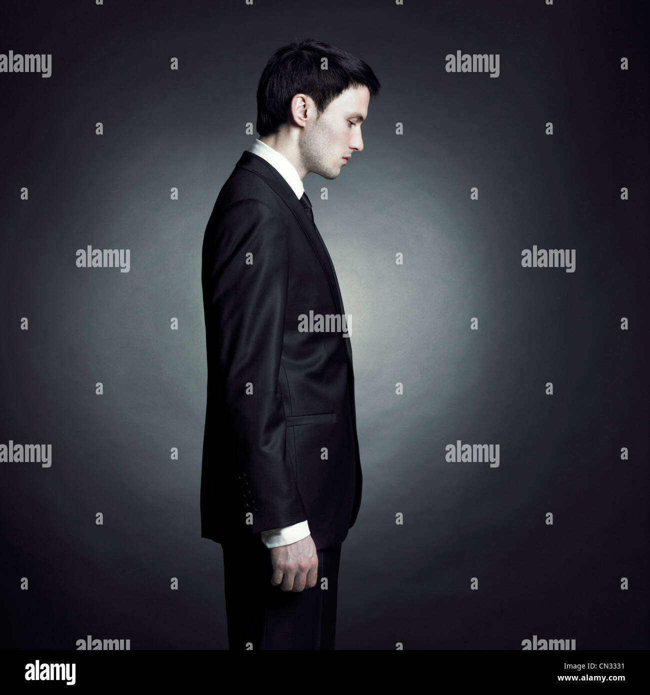 Portrait of handsome stylish man in elegant black suit Stock Photo - Alamy