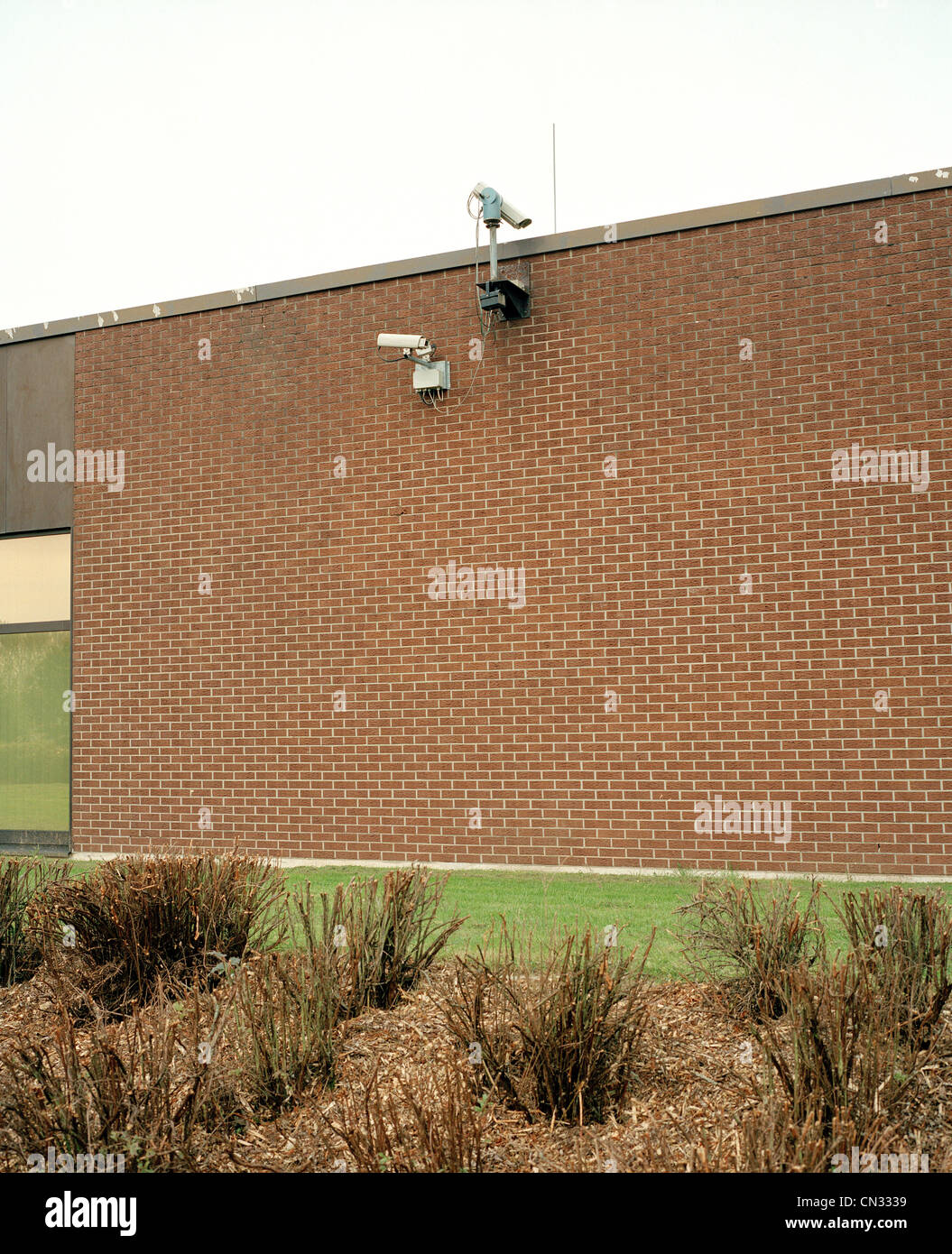 Building protected by security camera Stock Photo - Alamy