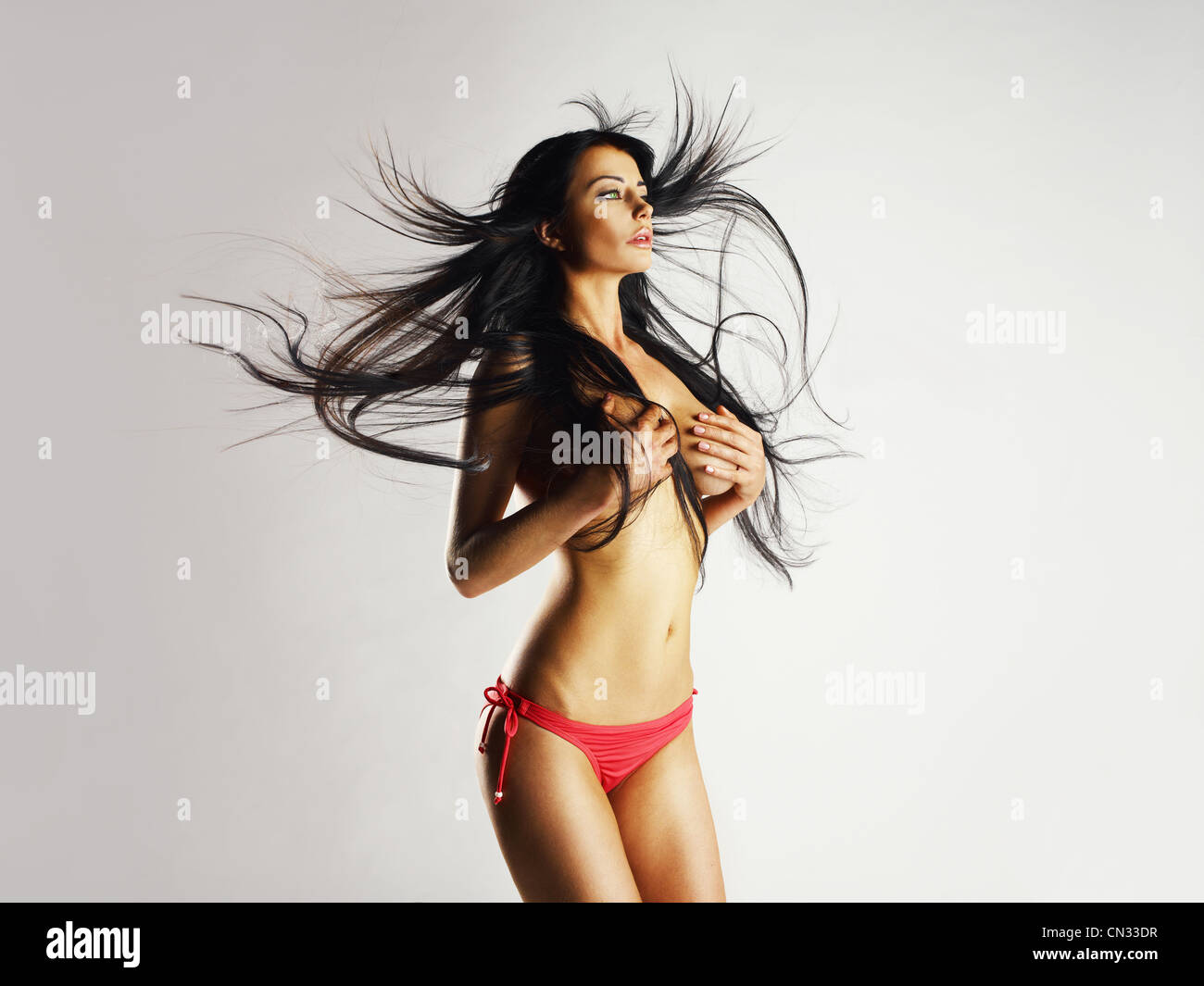 Fashion photo of beautiful nude woman with magnificent hair Stock Photo -  Alamy