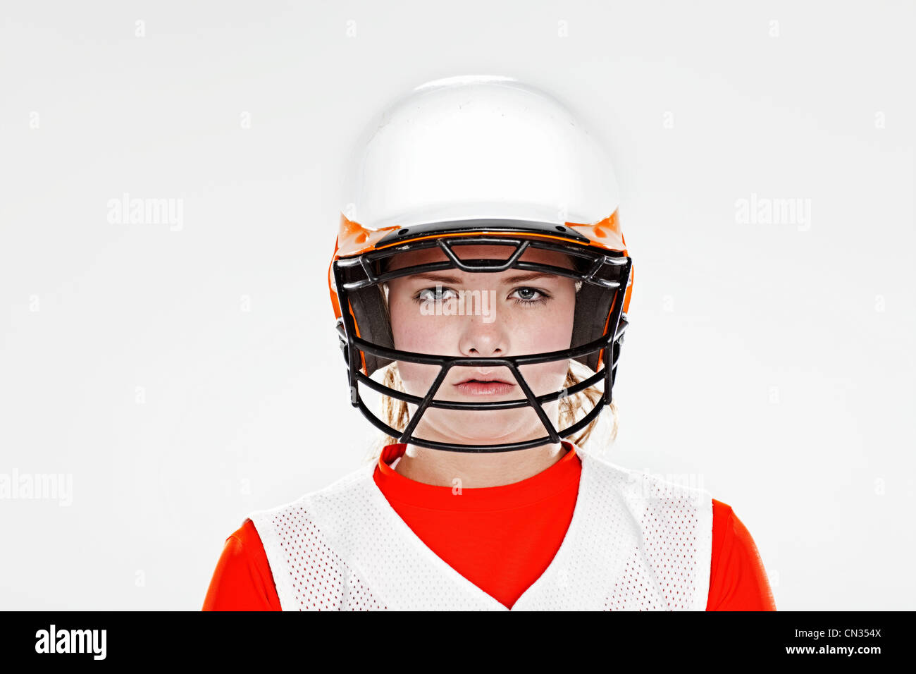 Female softball player wearing protective helmet, portrait Stock Photo Alamy