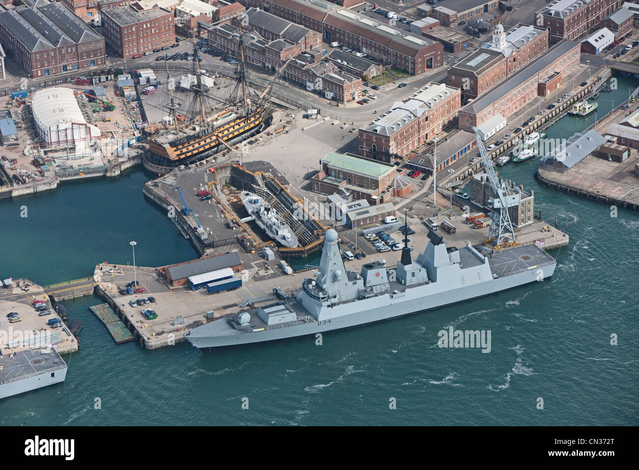Aerial Photograph of Portsmouth Harbour Showing HMS Victory and Modern Destroyer Stock Photo