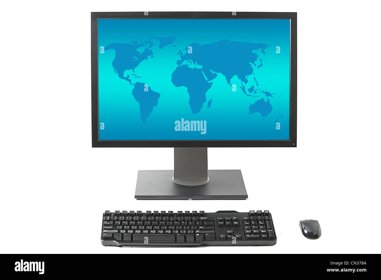 Computer workstation ( monitor, keyboard, mouse) with world map
