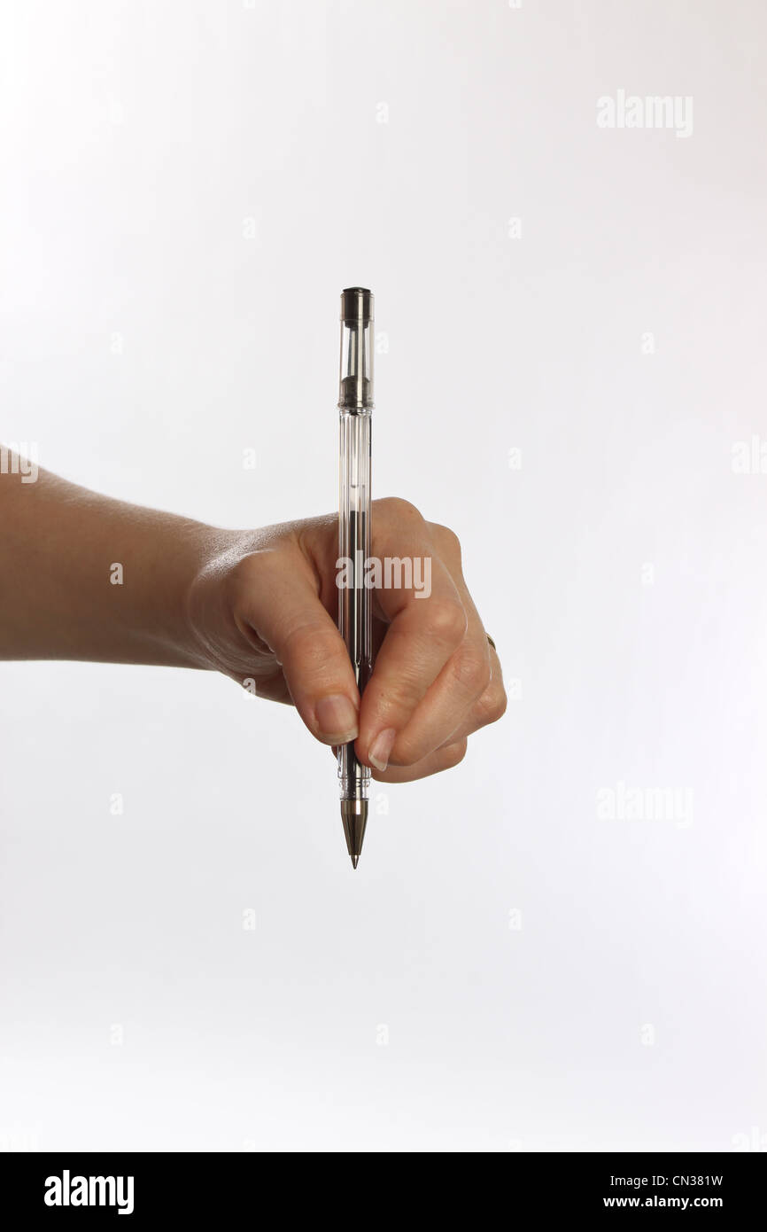 close up of a hand holding a pen Stock Photo Alamy