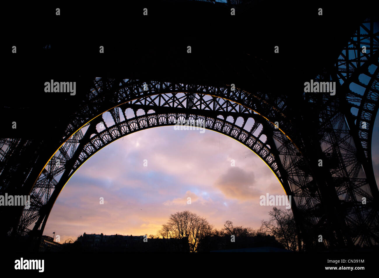Underneath Eiffel Tower at sunset, Paris, France Stock Photo